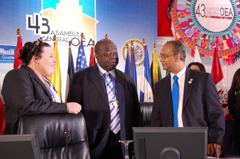 Bahamas Foreign Service Officer Kimberly Lam, Bahamas Permanent Representative Elliston Rahming and ASG Albert Ramdin converse prior to the plenary commencement of  the 43rd OAS General Assembly in Guatemala - 4 June, 2014