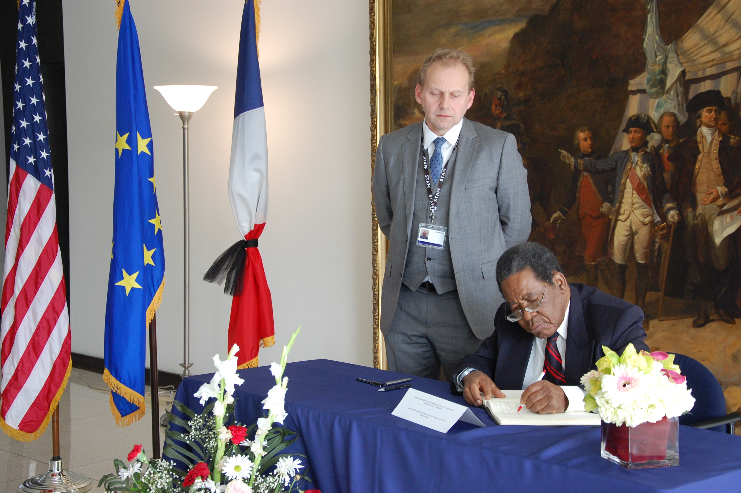 Ambassador Newry signs condolences at French Embassy
